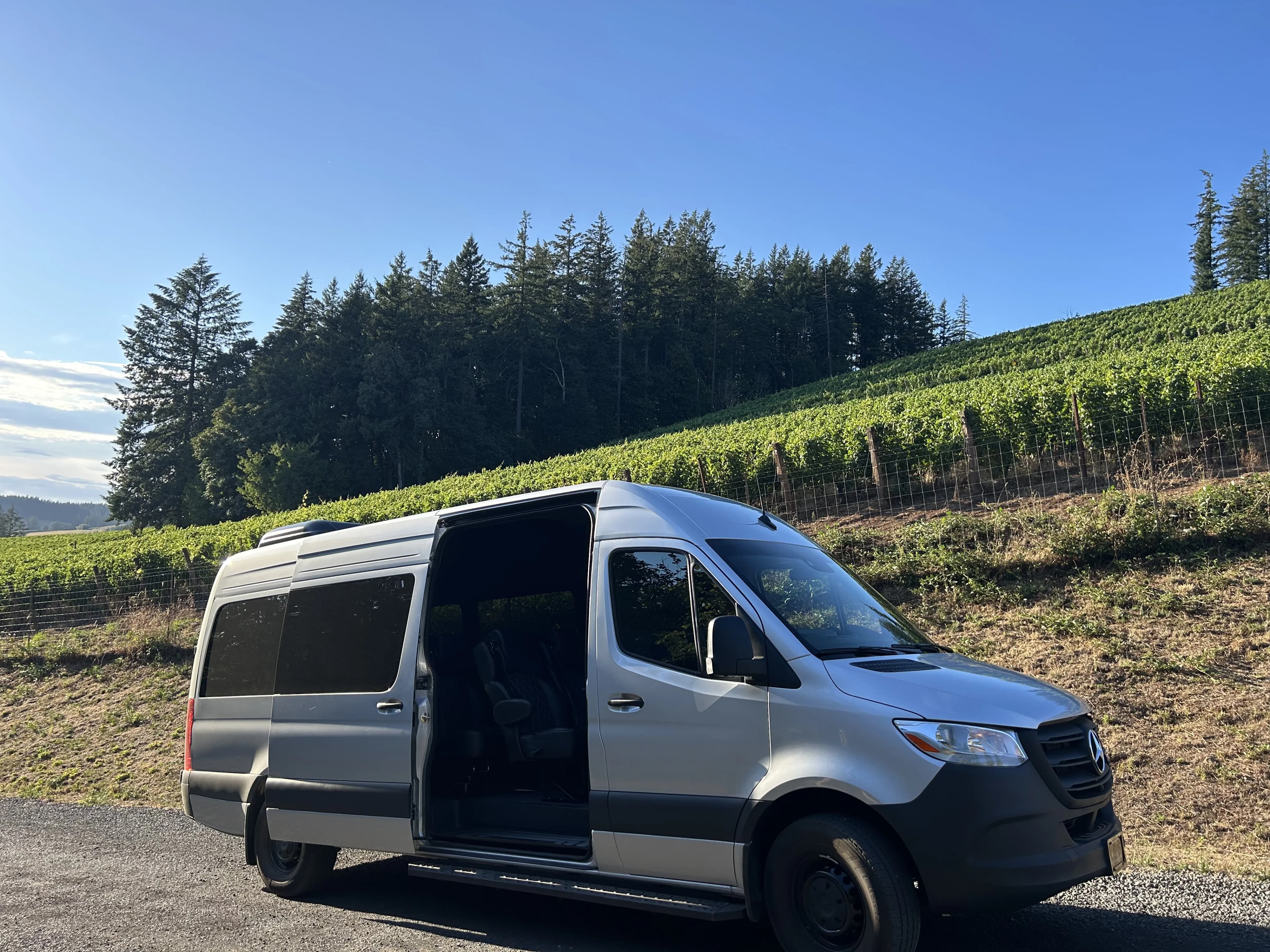 Hidden Vineyards tour van at an Oregon vineyard